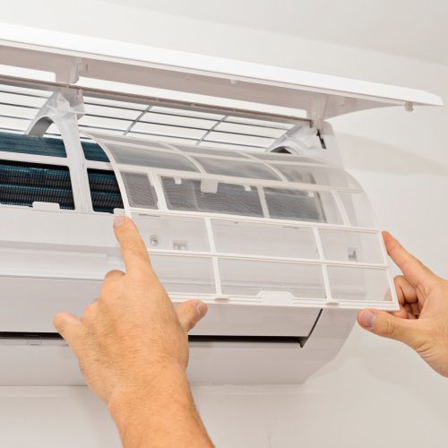 changing-the-filter-of-the-air-conditioner.jpg